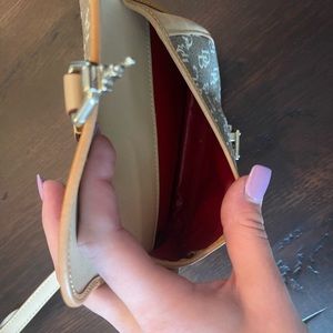 Dooney and Bourke clutch wallet.